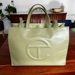 Telfar Medium Shopping Bag in color “drab.”
